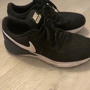 Nike running shoes . Used but still have some use to them.